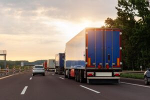 truck accident cases Heavy truck traffic on a Detroit highway illustrating common causes of truck accidents such as congestion and driver fatigue.