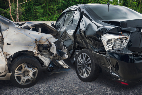 Michigan motorcycle accident lawyer image of severe vehicle collision showing major impact damage