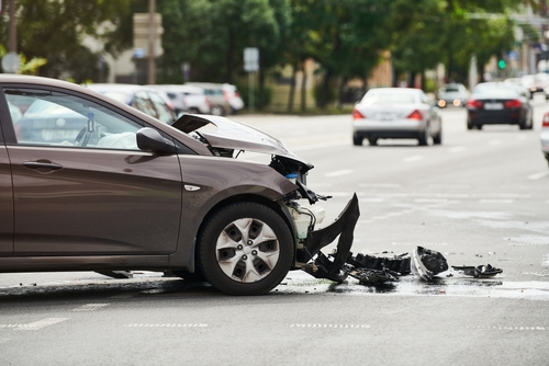 Michigan car accident lawyer helps you claim emotional distress damages with image of damaged car after collision