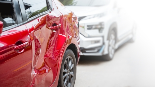 Michigan car accident lawyer image of damaged vehicles after collision showing impact of crash